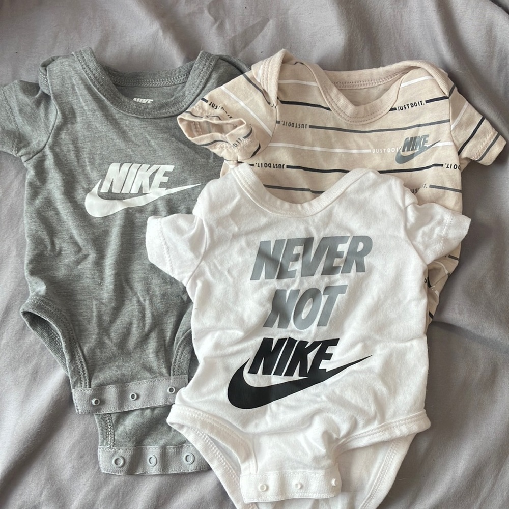 Set of three NIKE onesies!
